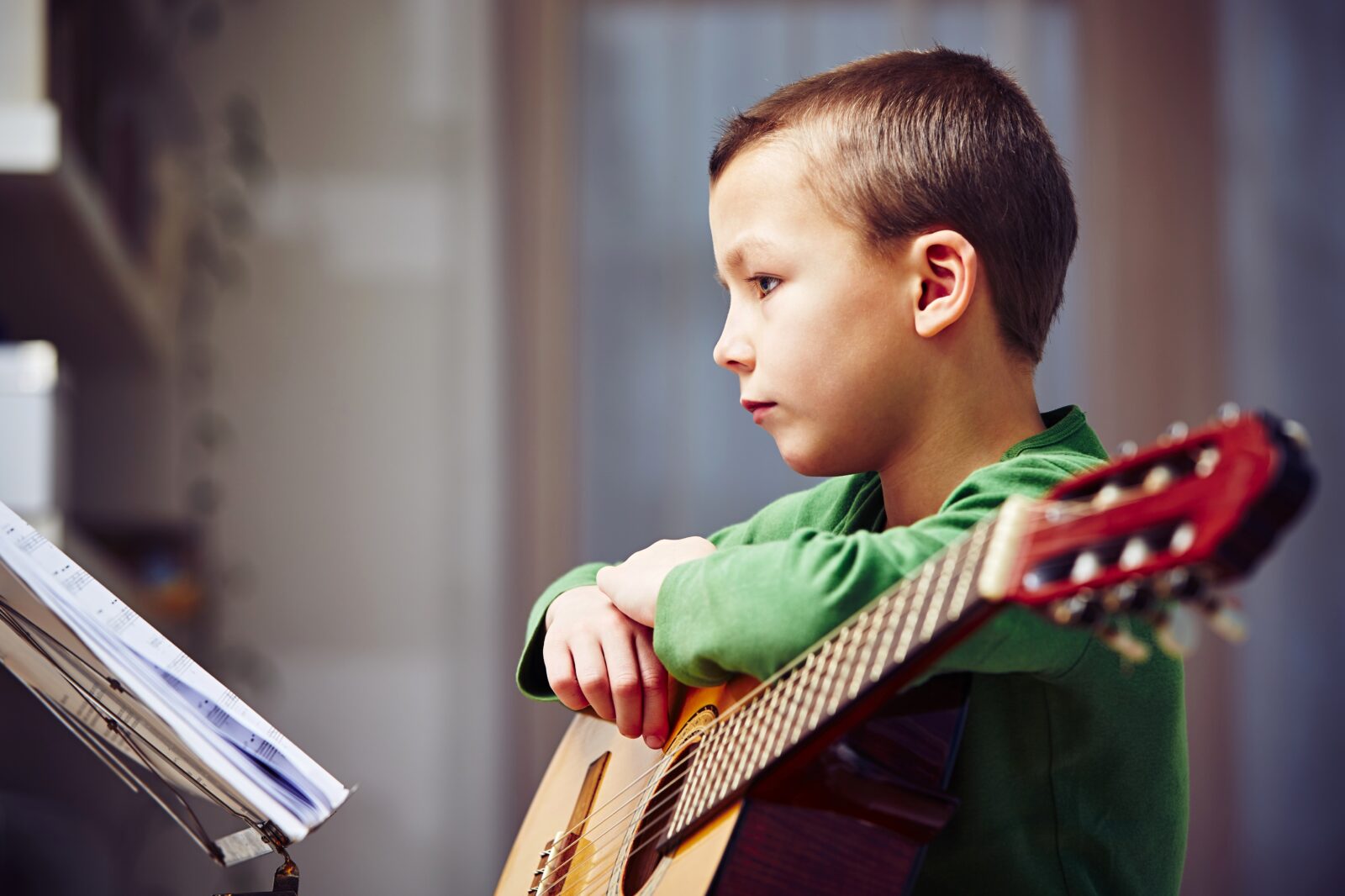 Boy studying his music